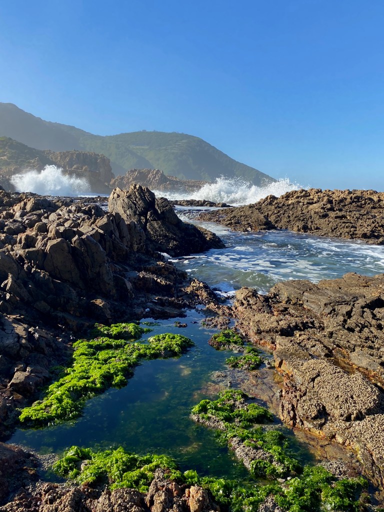 Waves breaking against the rocks along the Fisherman's Walk hiking trail at Brenton-on-sea