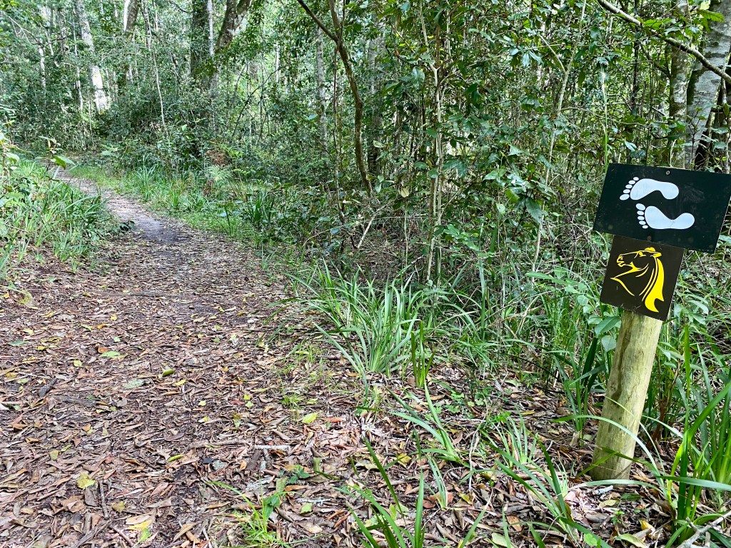 The Perdekop Trail is marked by signs of a horse's head