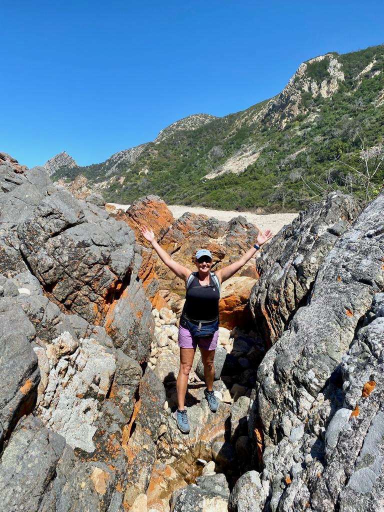 Clambering over rocks on the Kranshoek Coastal Trail