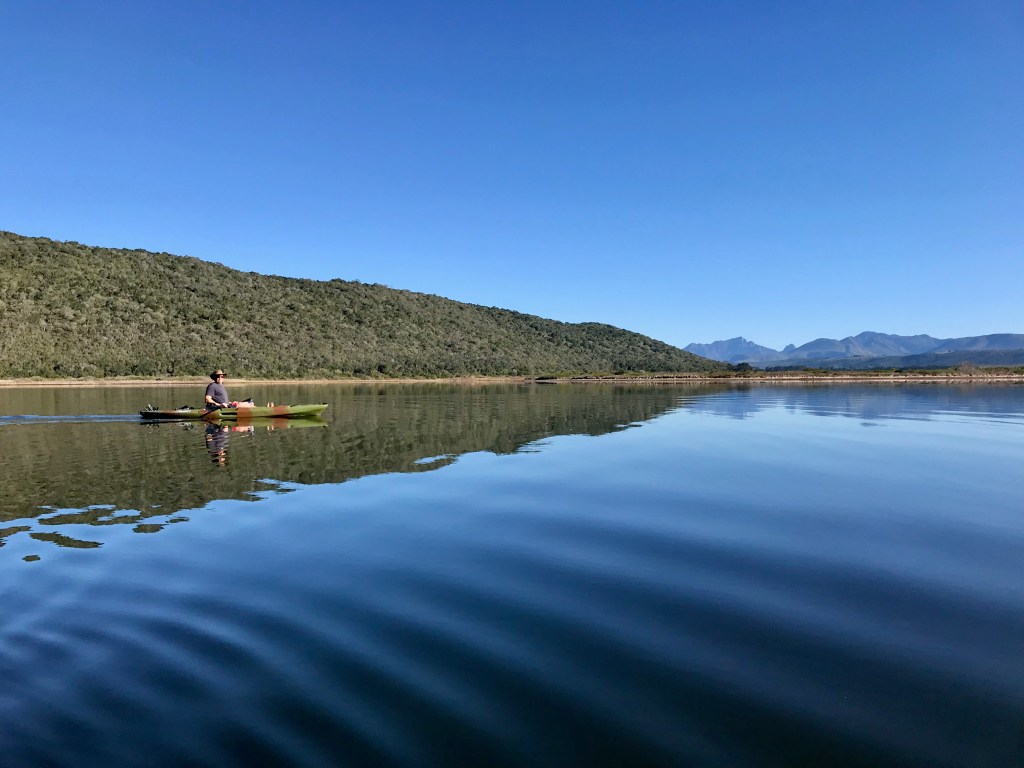 Fishing kayak on Swartvlei Lagoon in Sedgefield on the Garden Route