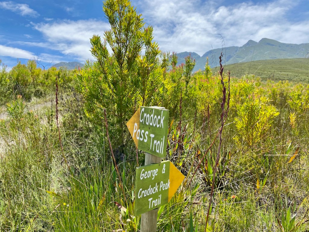 George ad Craddock Peak Hiking Trail signs
