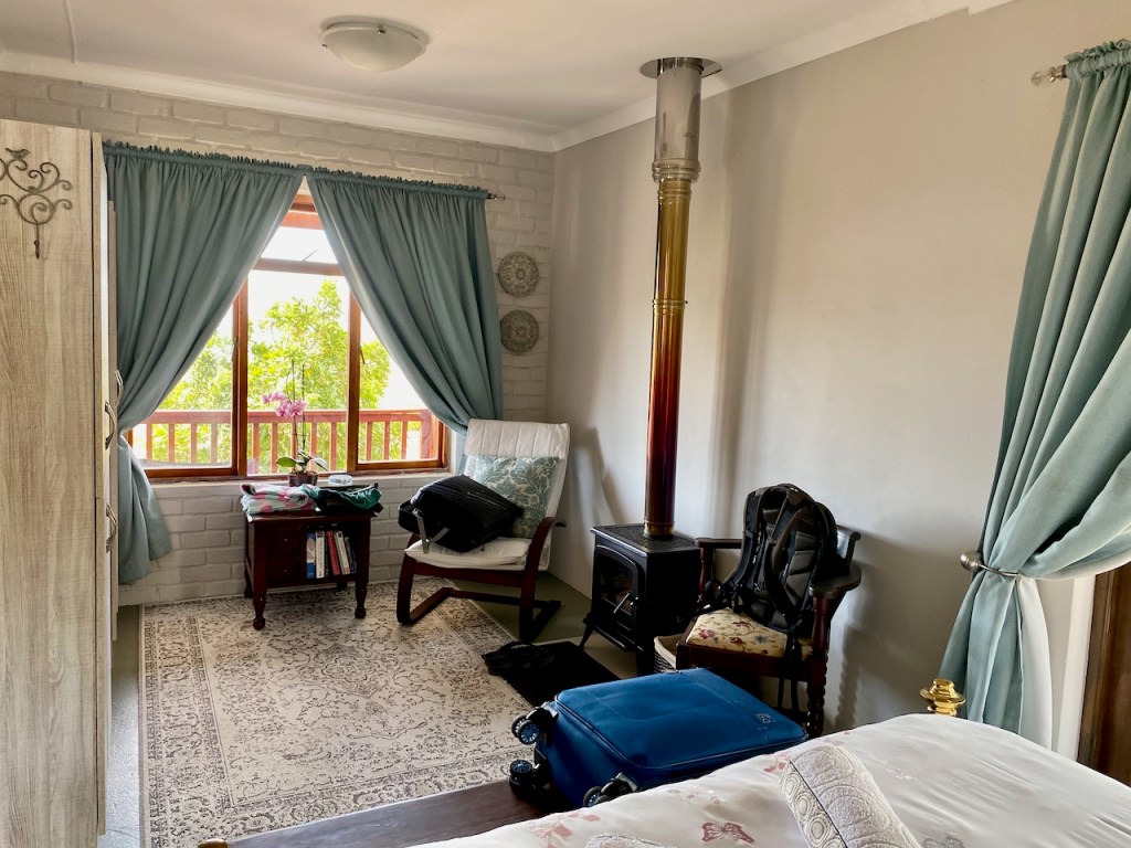 Log burner in the bedroom at Breathe Karoo