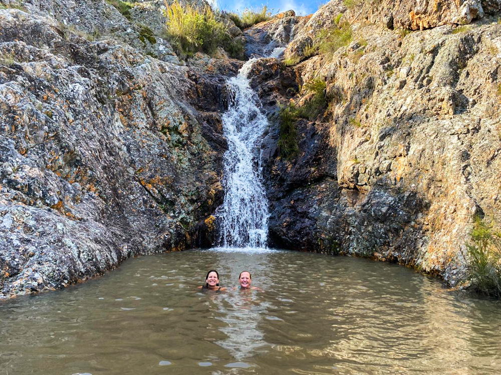 Swimming in ther pool below the waterfall